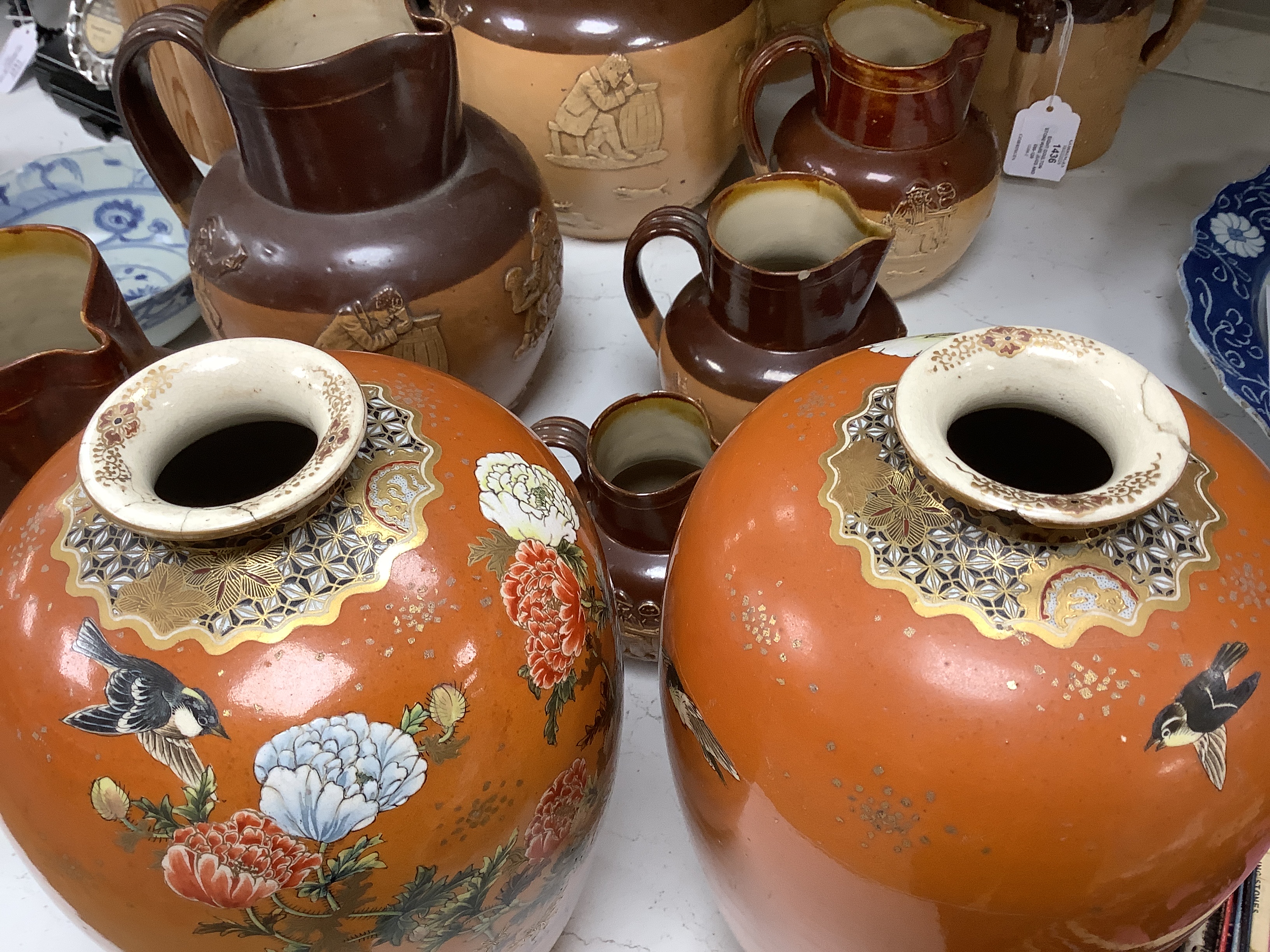 A pair of Japanese Satsuma vases, by Taizan and four others including a lidded jar and a basket vase stamped Noritake, tallest 25cm